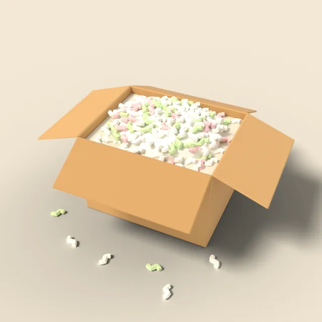 Open cardboard box with packing peanuts