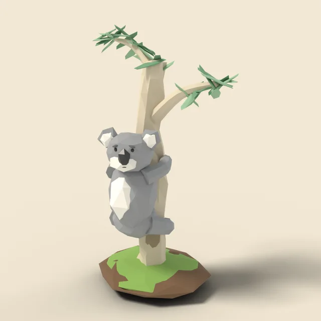 Koala clinging to branch