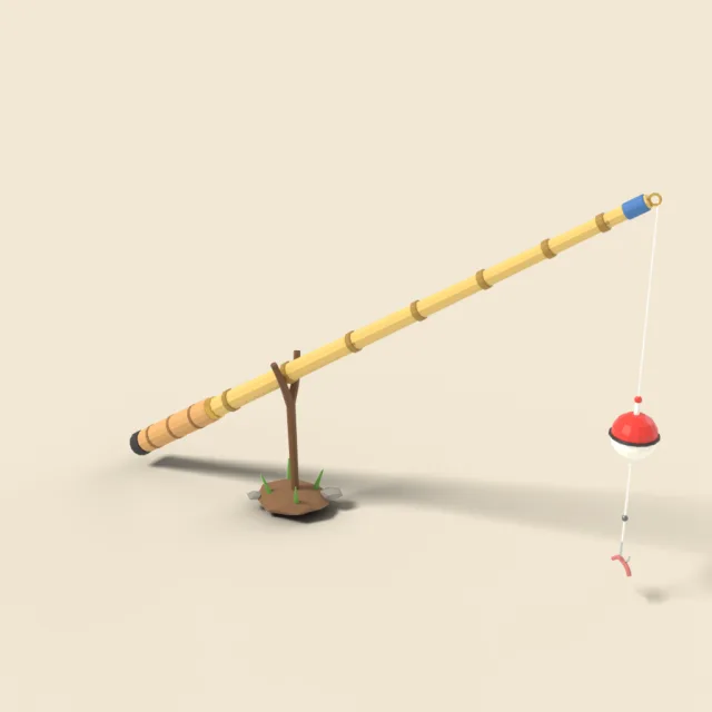 Bamboo fishing pole with bobber