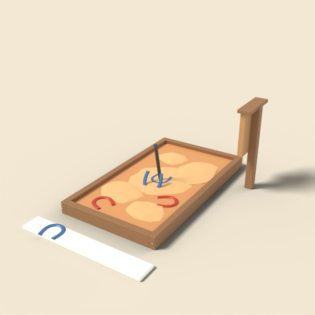 Horseshoe throwing pit with stake