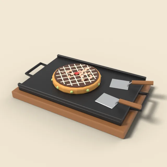 Okonomiyaki on a griddle