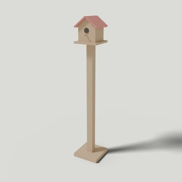 Gabled wooden birdhouse on a post
