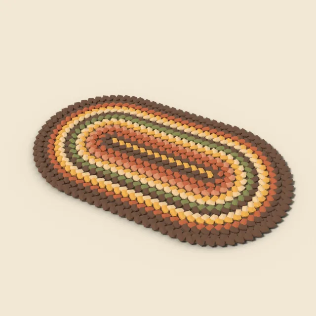 Oval braided rug in earth tones