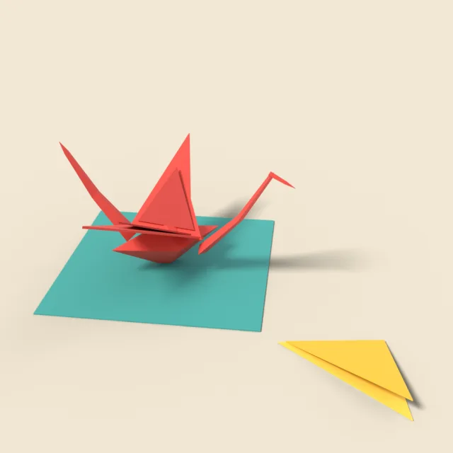 Folded paper crane on desk