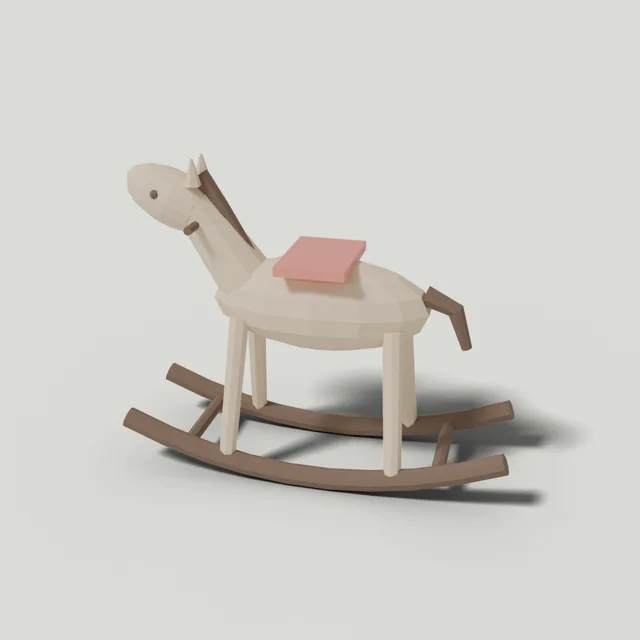 Wooden rocking horse with red saddle