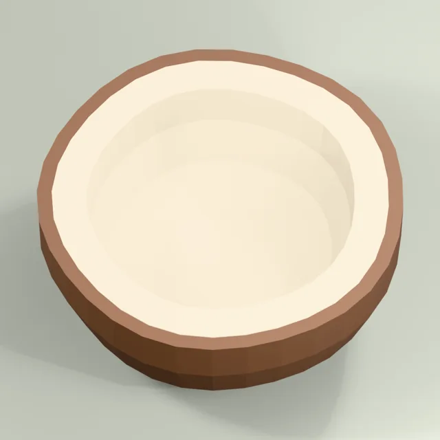 Open coconut half with thick shell and white flesh cavity