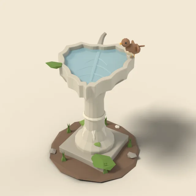 Stone birdbath with leaf basin