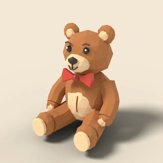 Sitting teddy bear with bow tie